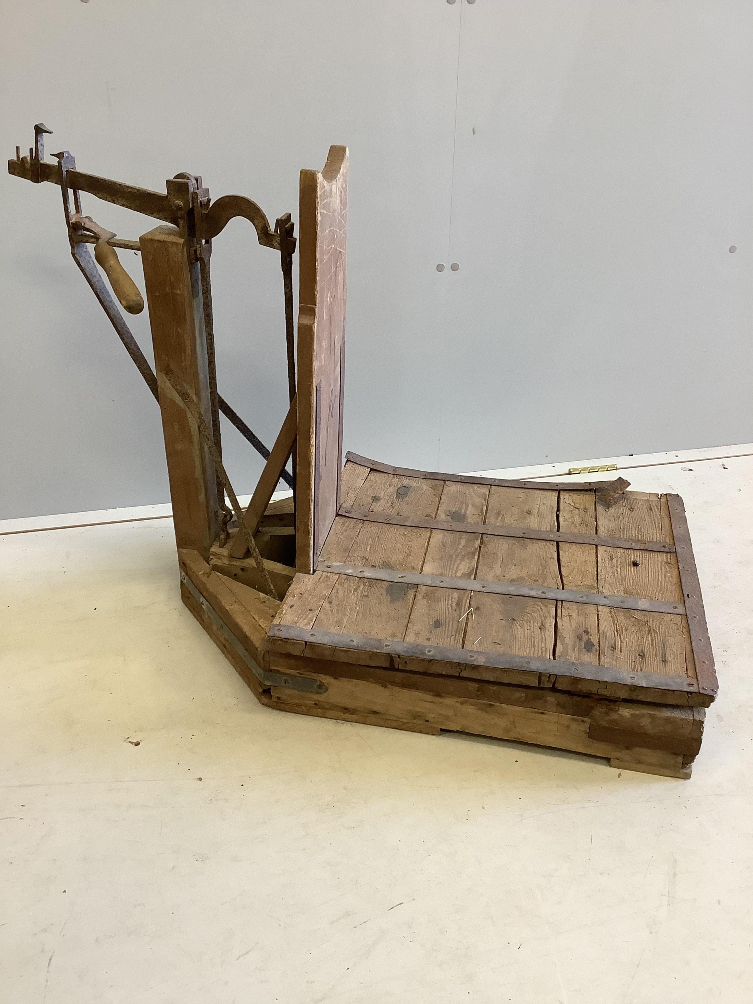 A set of iron bound wood sack scales, height 70cm. Condition - poor